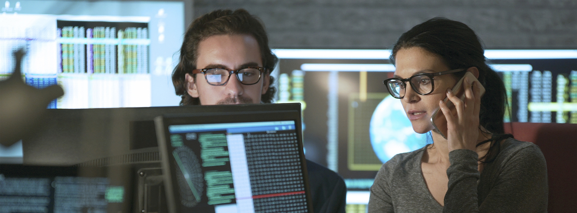 IT professionals monitoring systems